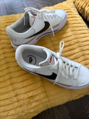 Nike Men’s White Leather Sneakers with Black Swoosh and Tan Accent